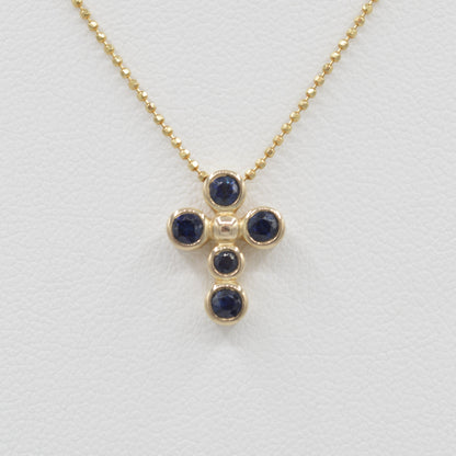 Dainty Sapphire Bezel Cross